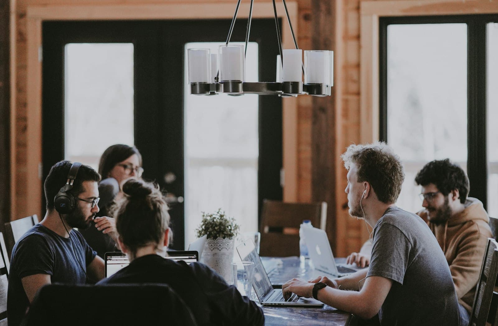 A team talking in a bright office, the kind of role this skill shows up in.